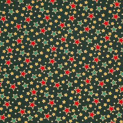 Red, green and gold stars with a metallic effect are printed on a green, 100% cotton fabric by Rose & Hubble.