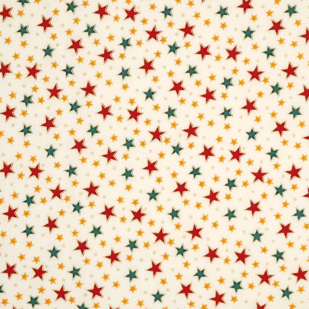 Red, green and gold stars with a metallic effect are printed on an ivory, 100% cotton fabric by Rose & Hubble.