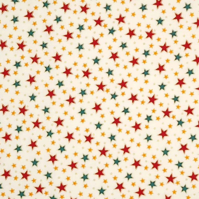 Red, green and gold stars with a metallic effect are printed on an ivory, 100% cotton fabric by Rose & Hubble.