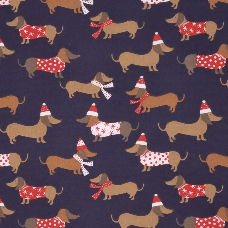 Dachshund sausage dogs in christmas jumpers printed on a navy polycotton fabric