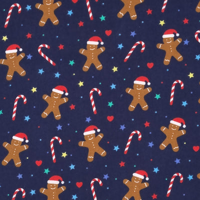 Smiley gingerbread men, hearts, stars and candy canes are printed on a navy polycotton fabric