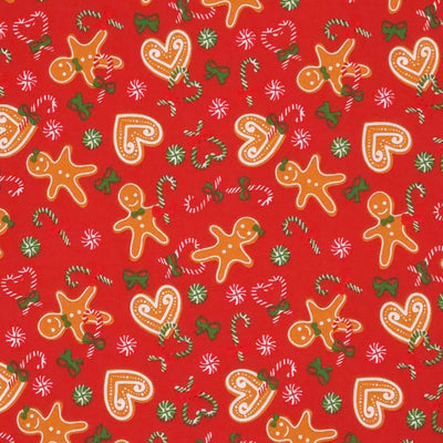 Cute gingerbread men, candy canes and hearts on a red polycotton fabric. 