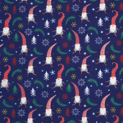 dancing and prancing Christmas gonks surrounded by scattered stars, snowflakes and leaves are printed on a navy polycotton fabric