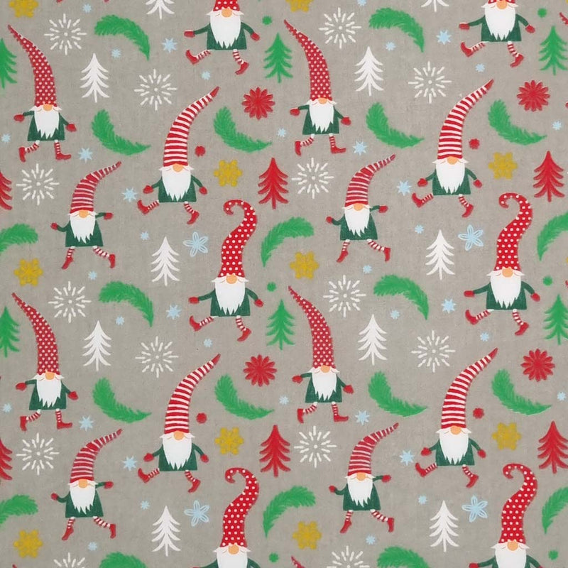 Dancing and prancing Christmas gonks surrounded by scattered stars, snowflakes and leaves are printed on a silver polycotton fabric
