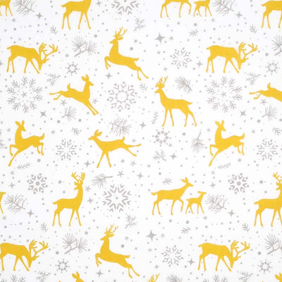 Prancing christmas reindeer with pretty stars and snowflakes are printed on a white polycotton fabric