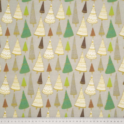 Intricate hand-drawn Christmas trees are printed on a silver polycotton fabric with a cm ruler at the bottom