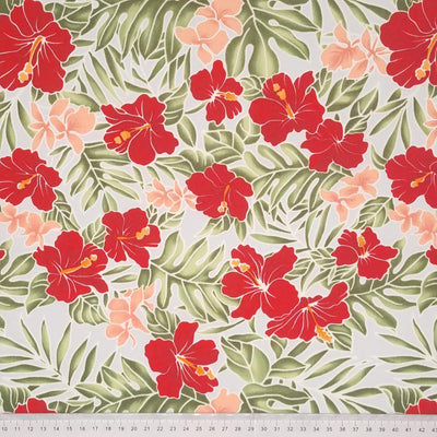 Vibrant pink and red flowers are printed on a pale grey coloured 100% cotton poplin with a cm ruler at the bottom