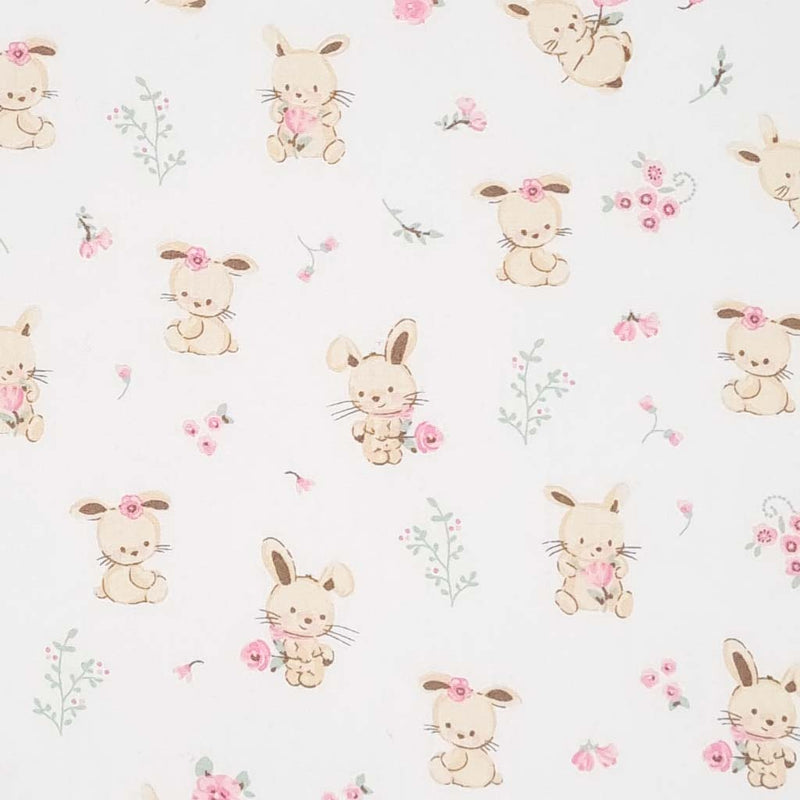 Cute bunnies and pink flowers printed on a white cotton poplin fabric