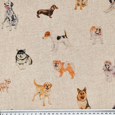 Different breeds of show dogs are printed on a craft canvas panama fabric with a cm ruler