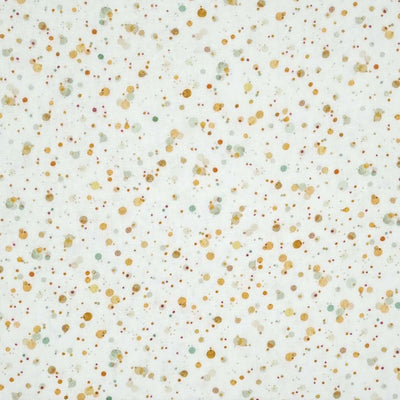 Sage and golden splatter dots are printed on a white, organic cotton double gauze fabric