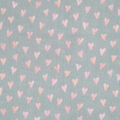 Small rose coloured hearts printed on an organic, mint double gauze fabric.