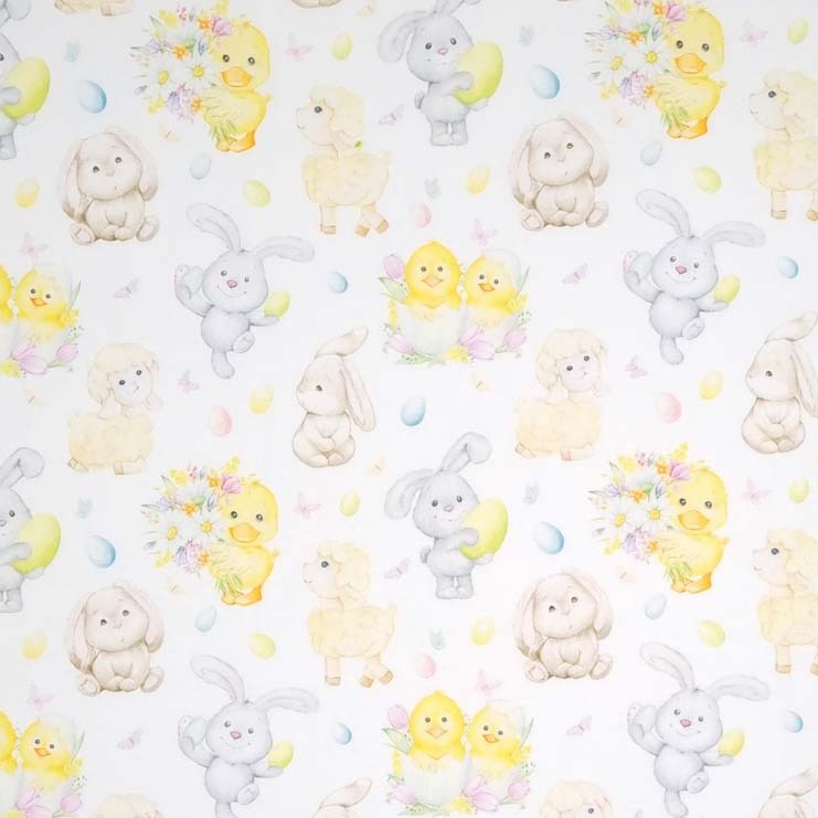 Easter bunnies, spring lambs , chicks and ducks are printed on a white cotton fabric