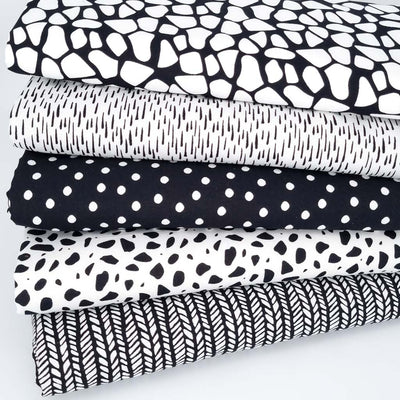 A funky black and white abstract jungle theme printed on 100% cotton fabrics