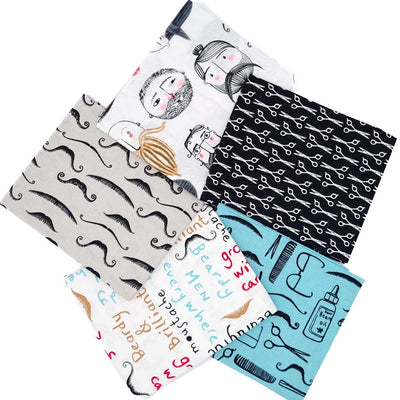 A fat quarter bundle printed with beards and moustaches
