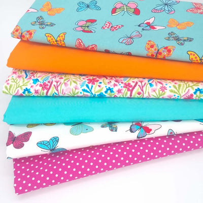 A bundle of 6 Rose and Hubble cotton poplin fabrics with butterfly and floral prints