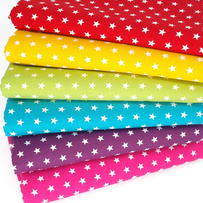 6 fat quarters of rainbow coloured cotton poplin fabrics with white stars