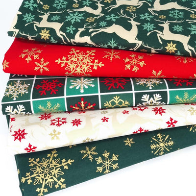 A beautifully coordinated festive fat quarter bundle in classic reds and greens with reindeer and snowflakes and of course some special christmas sparkle