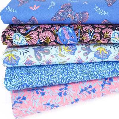 A cotton fat quarter bundle with butterflies and florals in blue and pink