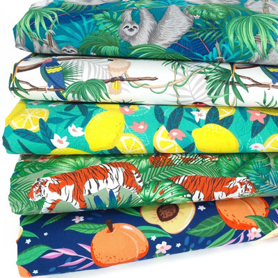 A cotton fat quarter bundle of 5 tropical animal prints 