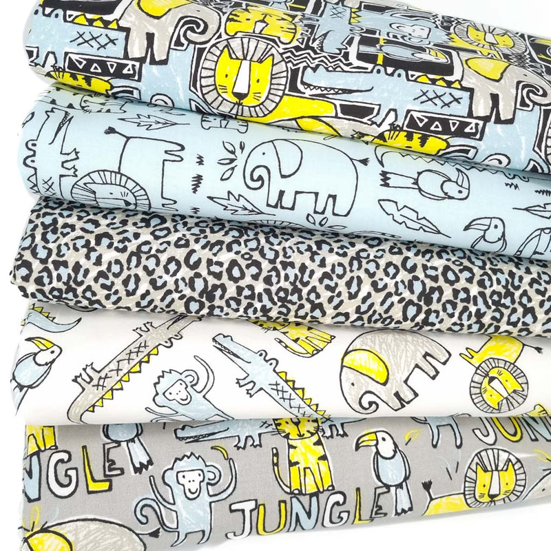 Jungle animals are printed on 5 cotton fat quarters in a bundle