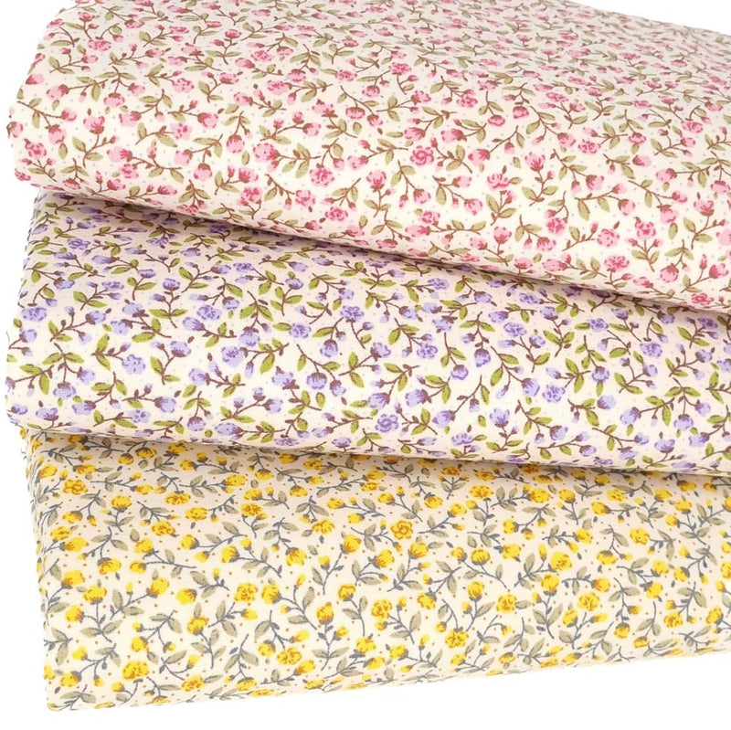 A fat quarter bundle of 3 tiny flowers floral patterns on cotton poplin