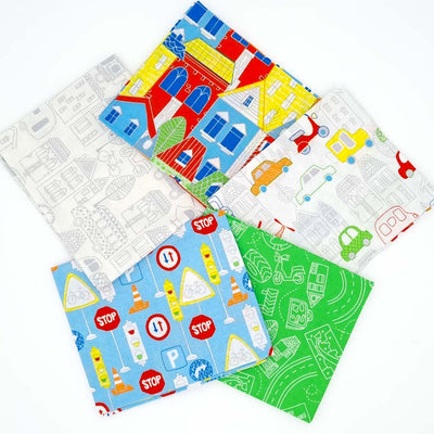A fun children's bundle of prints featuring houses, road signs and vehicles, printed on 100% cotton fabrics.