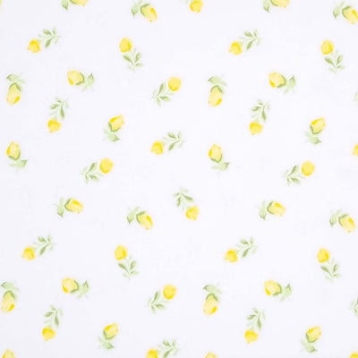 A small and delicate lemon yellow baby rose printed on a quality white polycotton fabric.