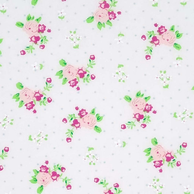 A pretty pink floral rose fabric print on white polycotton