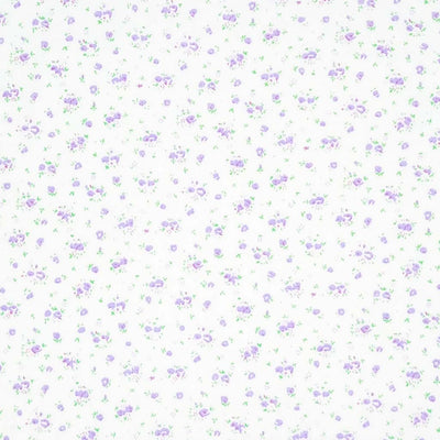 A ditsy lilac rose bud fabric print on polycotton