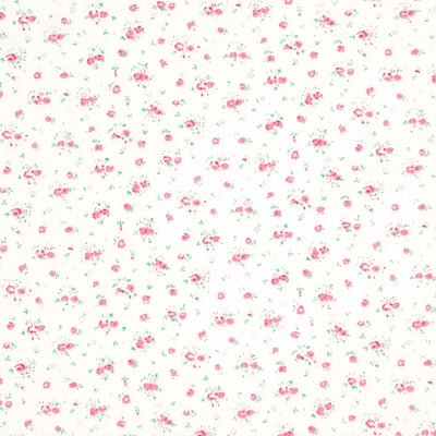 A ditsy pink rose bud fabric print on polycotton