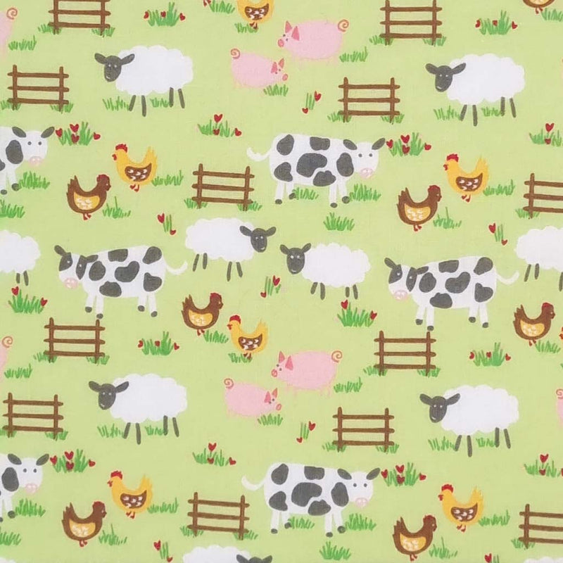 Chicken, sheep, cows and pigs are printed on a green polycotton fabric