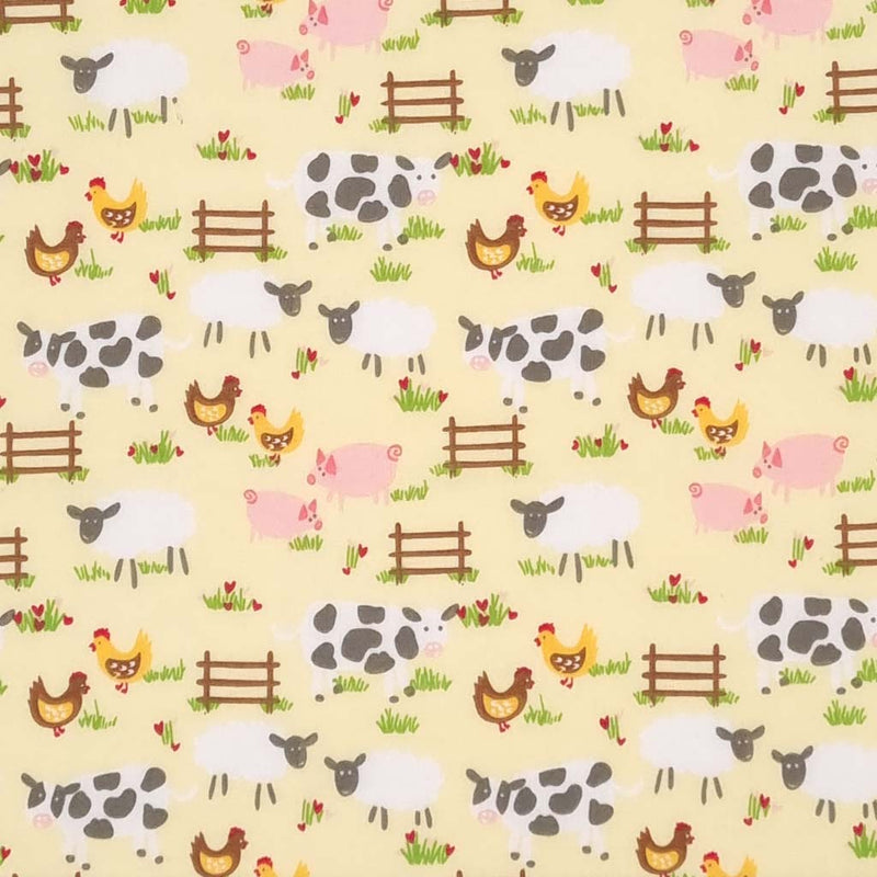 Chickens, sheep, pigs and cows are printed on a lemon yellow polycotton fabric