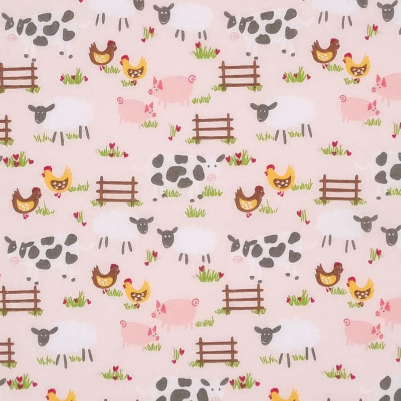 Chickens, sheep, pigs and cows are printed on a pale pink polycotton fabric