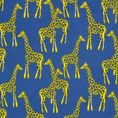 A giraffe fabric print in yellow and blue