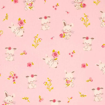 Sweet bunny rabbits printed on a pink, organic cotton poplin fabric