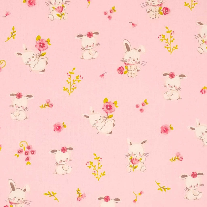 Sweet bunny rabbits printed on a pink, organic cotton poplin fabric