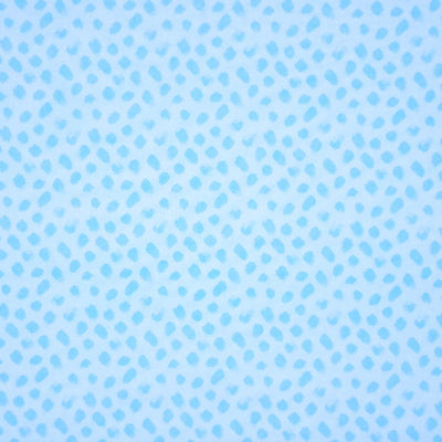 Blue paint dabs are printed on a sky blue 100% cotton fabric