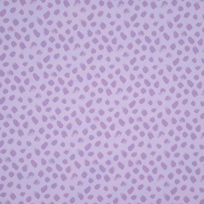 Lilac paint dabs are printed on a lilac, 100% cotton fabric