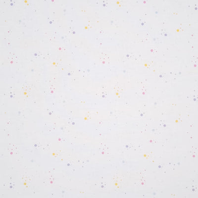 Pastel speckled spots printed on a white, 100% cotton fabric