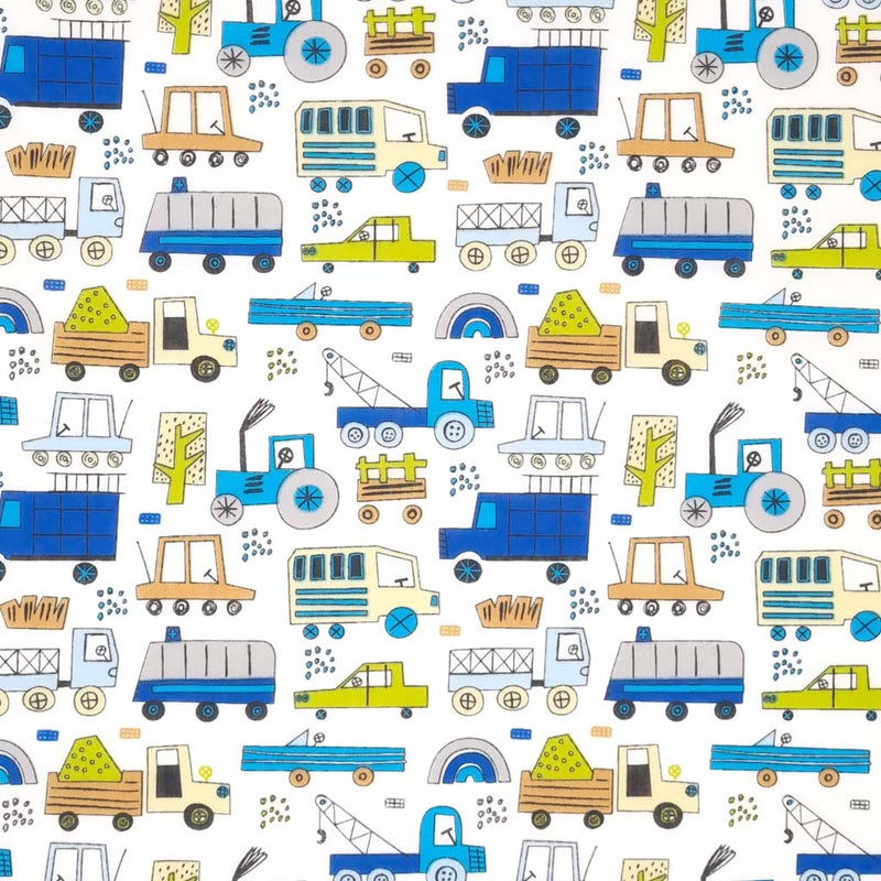 Fun construction vehicles are printed on a white polycotton fabric. 
