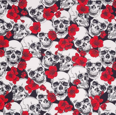 Gothic skulls and red poppies on a black,100% cotton poplin fabric.