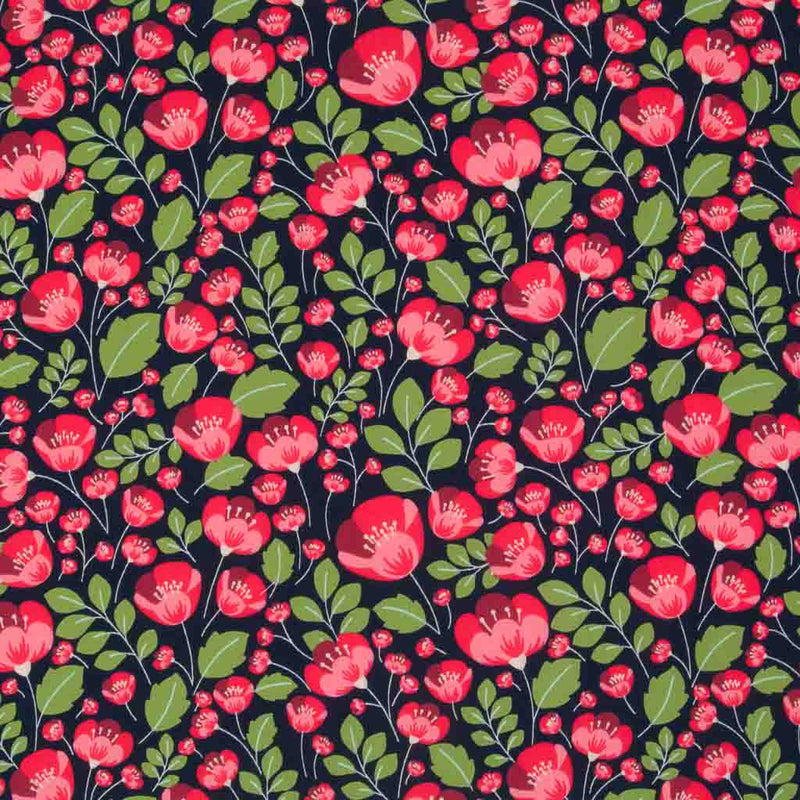 Small red poppies and green leaves are printed on a navy 100% cotton poplin fabric