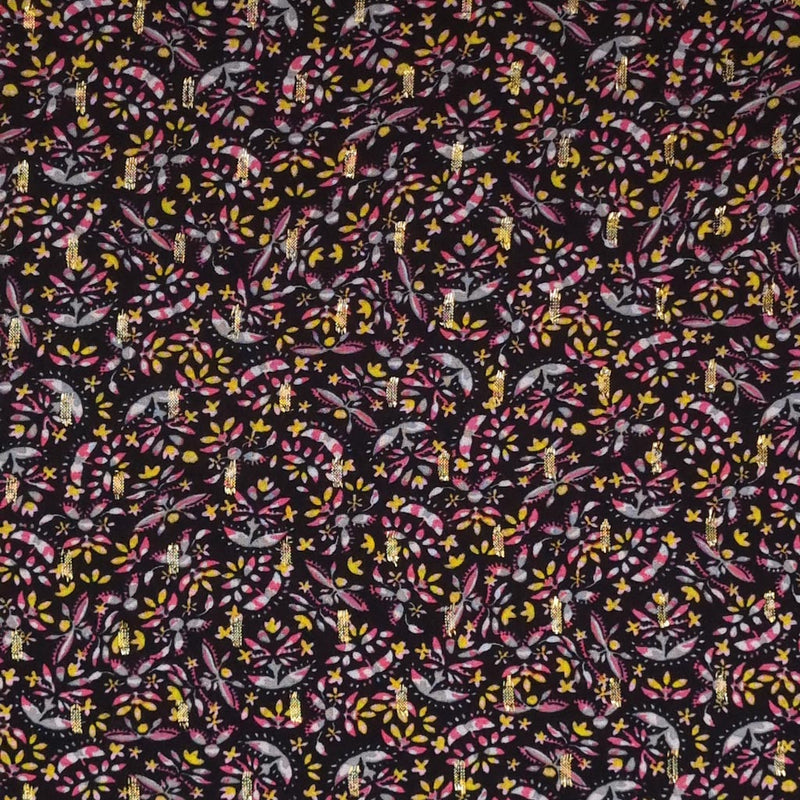 A ditsy floral design with golden lurex printed on a black viscose fabric