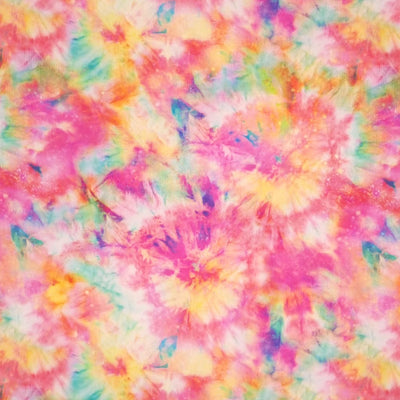 A viscose fabric printed with a colourful tie dye design