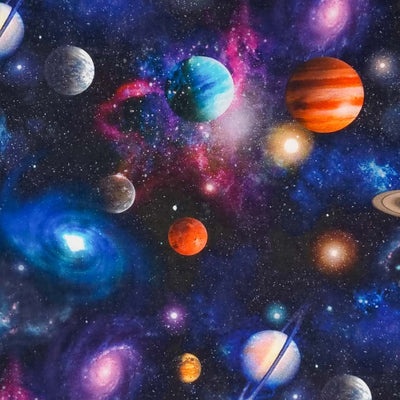 Planets, moons and black holes printed on a cotton fabric by Little Johnny