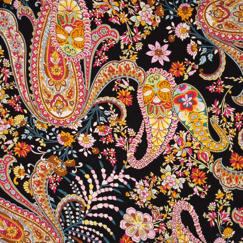 A beautiful paisley floral print in a black, orange and pink colourway on a viscose jersey fabric
