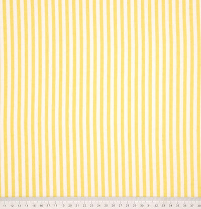 Yellow and white candy stripes printed on a soft brushed polycotton winceyette with a cm ruler at the bottom