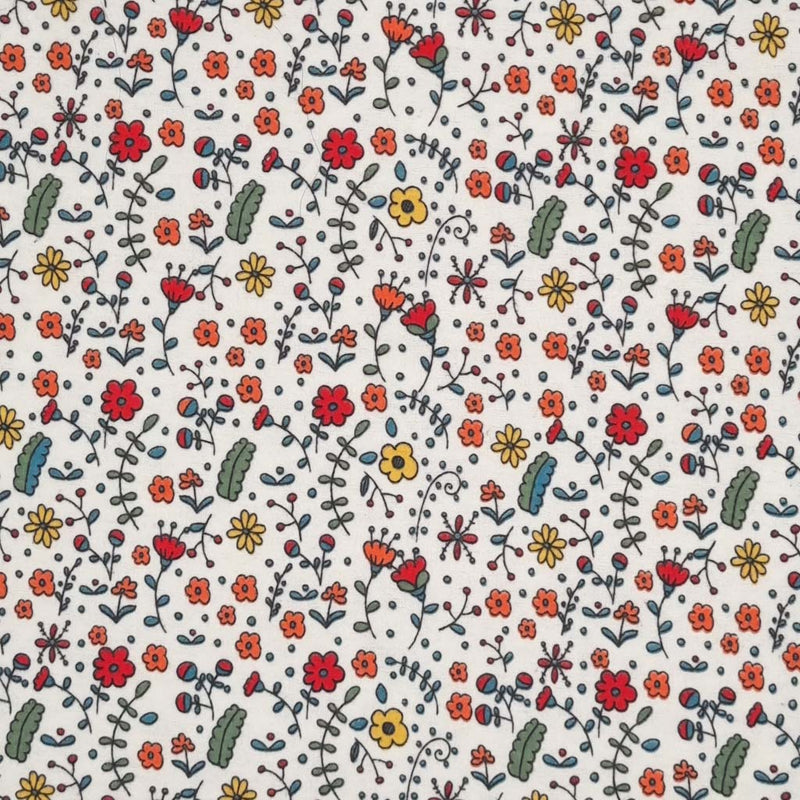 A funky floral design in red, orange and green, printed on a white, soft brushed polycotton winceyette.