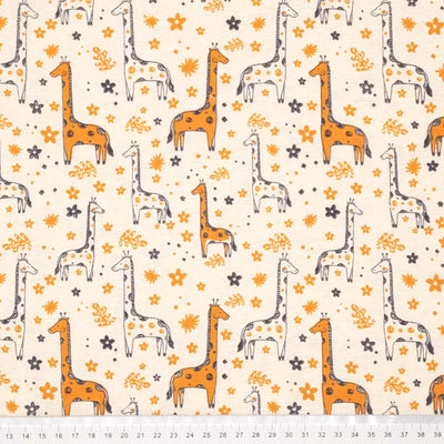 A beautiful giraffe design, printed on a soft brushed polycotton winceyette in cream