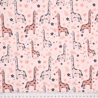 A beautiful giraffe design, printed on a soft brushed polycotton winceyette in light pink with a cm ruler at the bottom